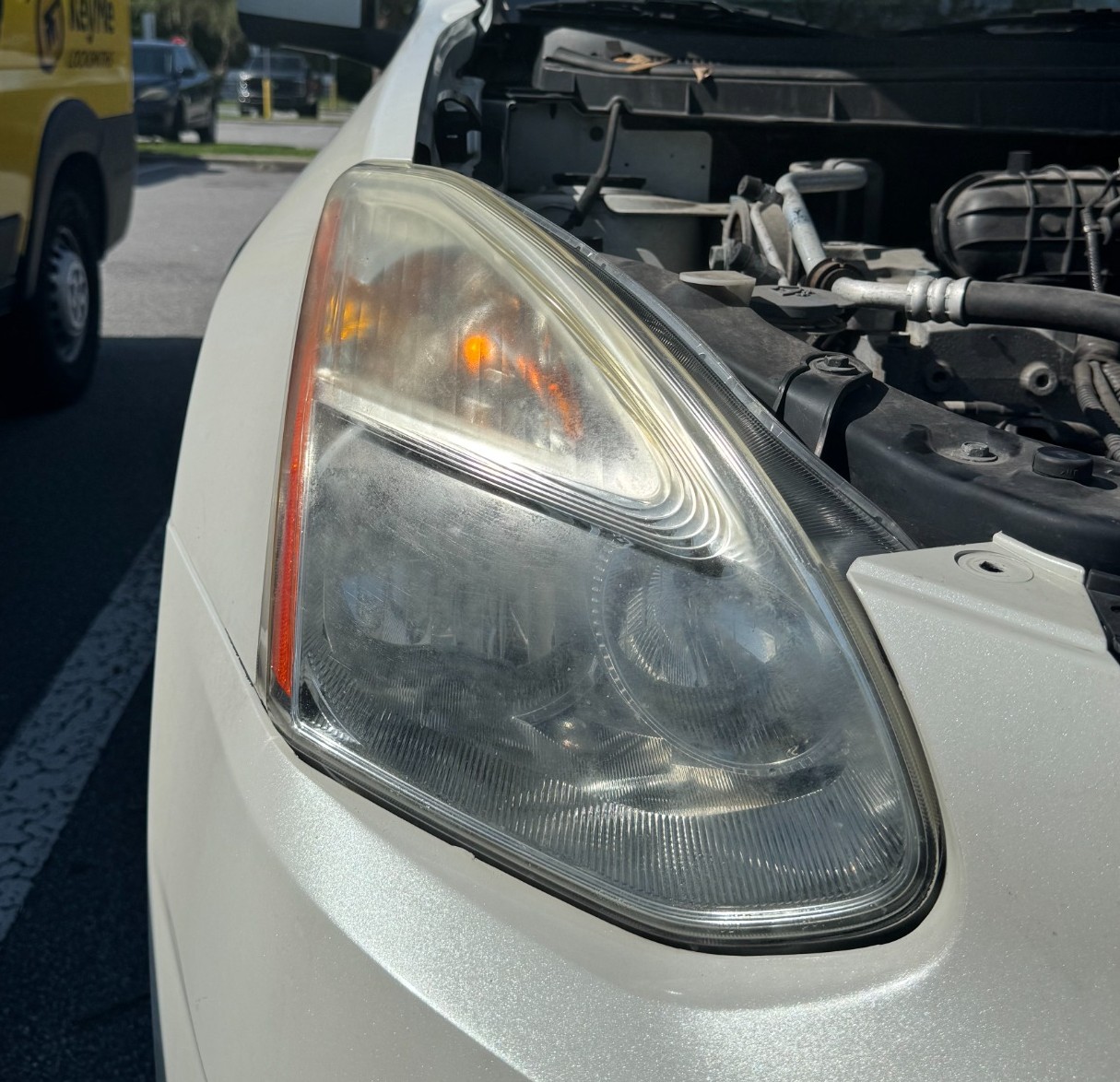 Cloudy and oxidized headlight before restoration