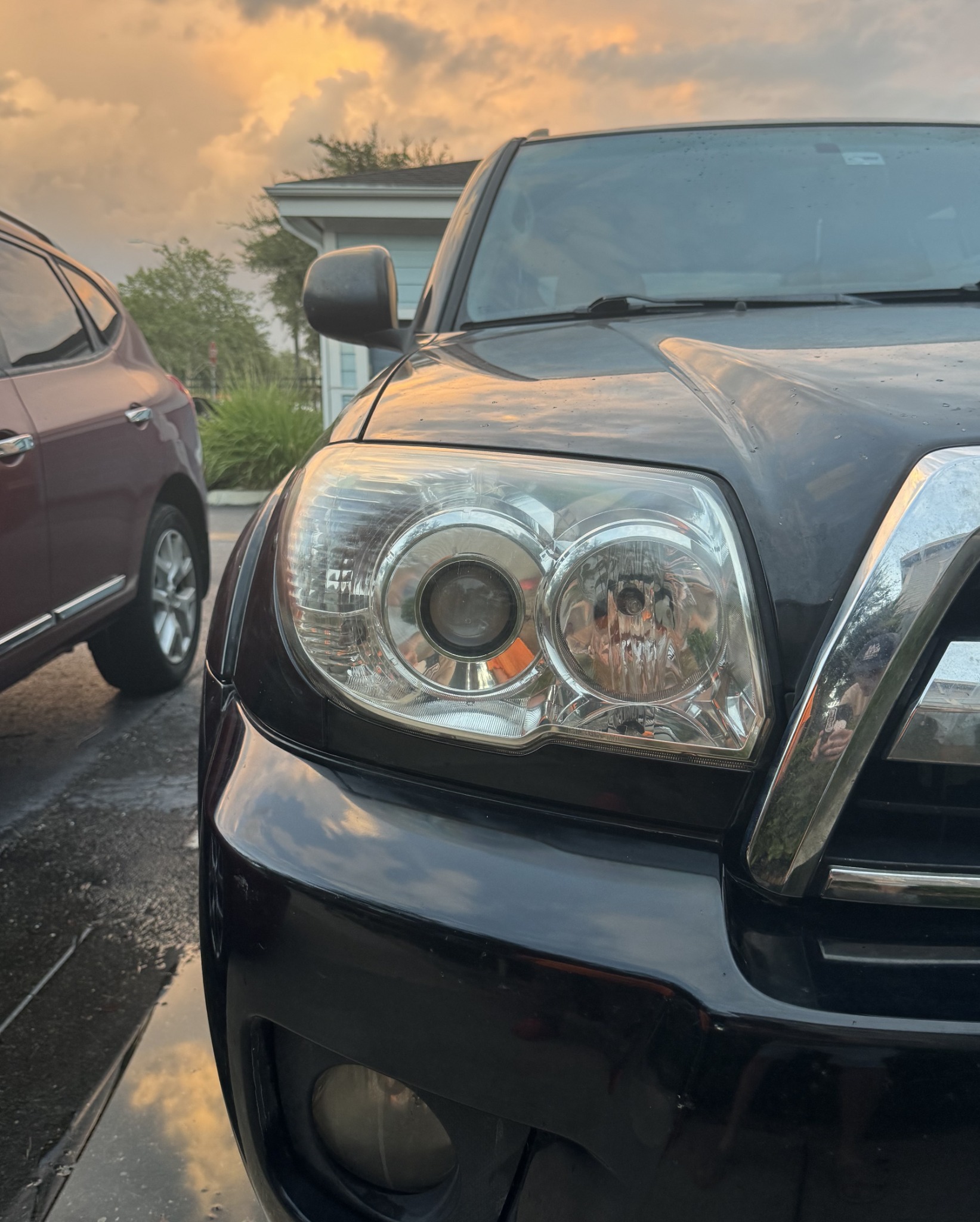 Black vehicle headlight after restoration