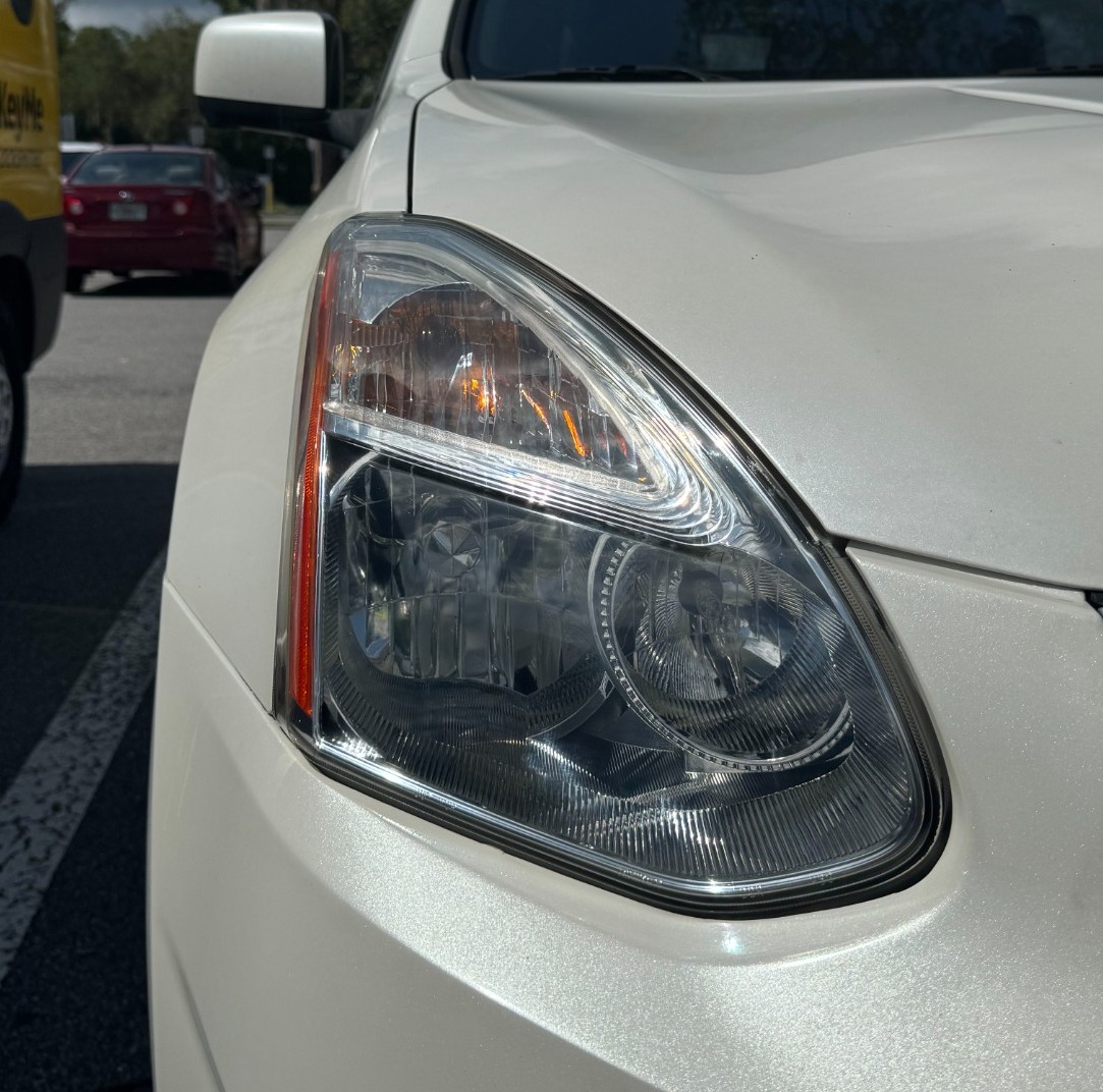 White vehicle headlight after restoration